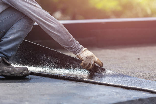 Professional Waterproofing technician working in Wolcott, NY